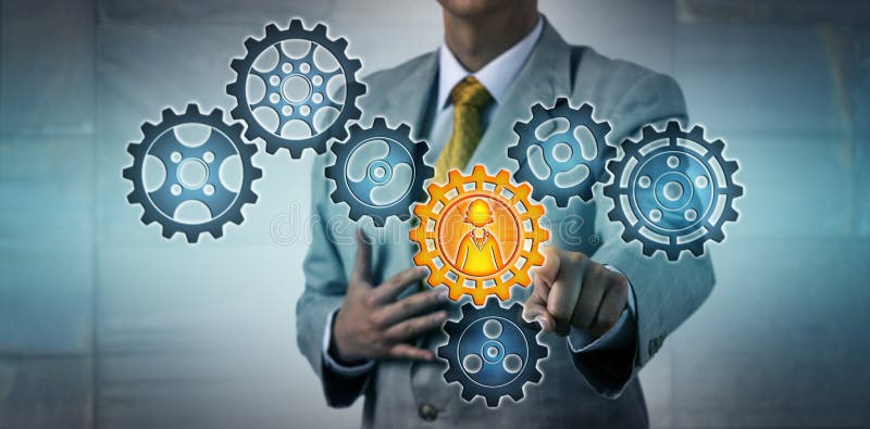Manager Activating Female Worker In Gear Train stock photography