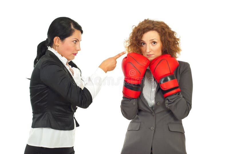 Manager arguing employee woman isolated on white background,conceptual image of employee woman trying to defend with boxing glove of accuser boss. Manager arguing employee woman isolated on white background,conceptual image of employee woman trying to defend with boxing glove of accuser boss