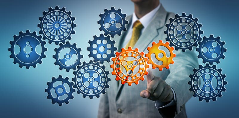 Manager Clicking Two Cogs In Virtual Gear Train royalty free stock photography