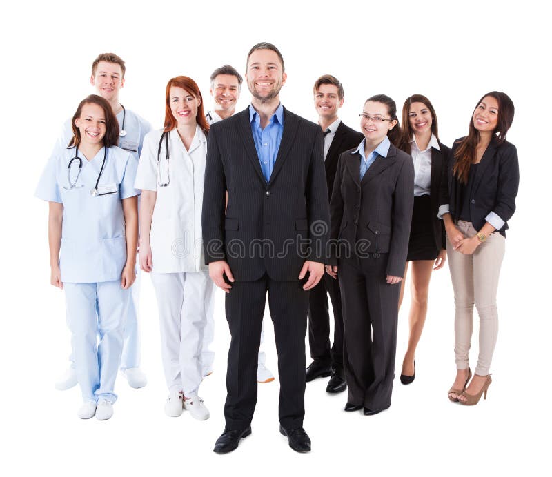 Manager die zich voor zijn team bevinden stock foto's Manager die zich voor zijn team bevinden stock foto's