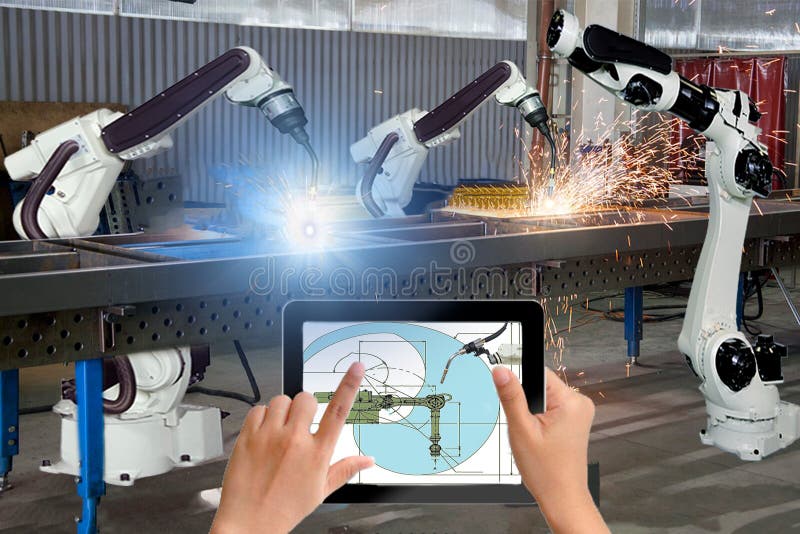 Manager engineer check and control automation robot arms machine in intelligent factory industrial on real time monitoring system royalty free stock photography Manager engineer check and control automation robot arms machine in intelligent factory industrial on real time monitoring system royalty free stock photography