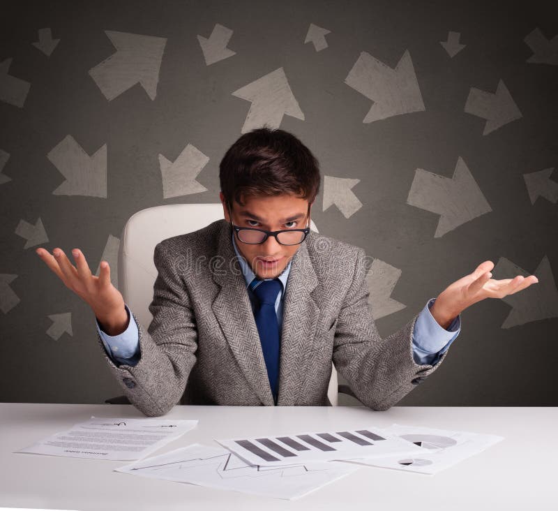 Manager in Front of the Office Desk with Direction Concept Stock Photo