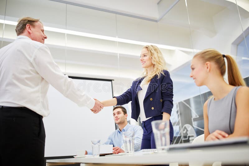 Manager gratulates succesful businesswoman royalty free stock images Manager gratulates succesful businesswoman royalty free stock images