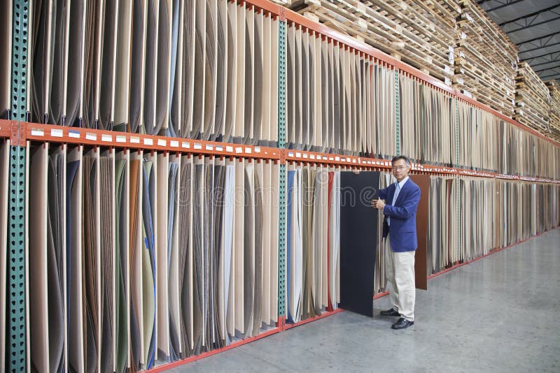 Manager Holding Plywood in Warehouse Stock Photo Image of holding