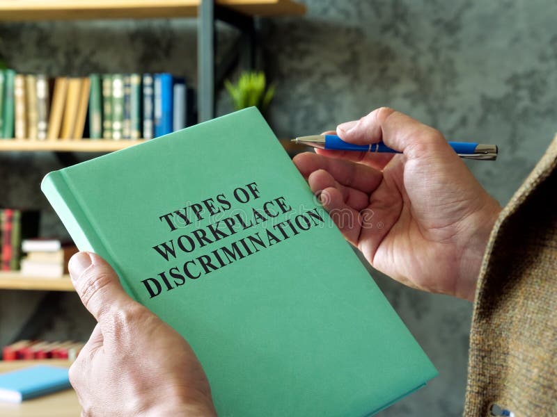 A Manager holds book types of workplace discrimination. Types conflict stock images, royalty-free photos and pictures