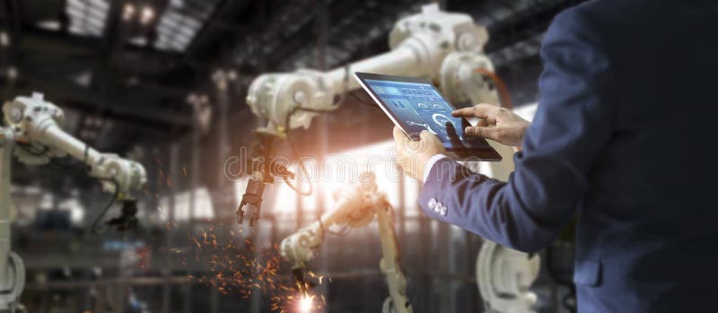 Manager industrial engineer using tablet for checking royalty free stock photography