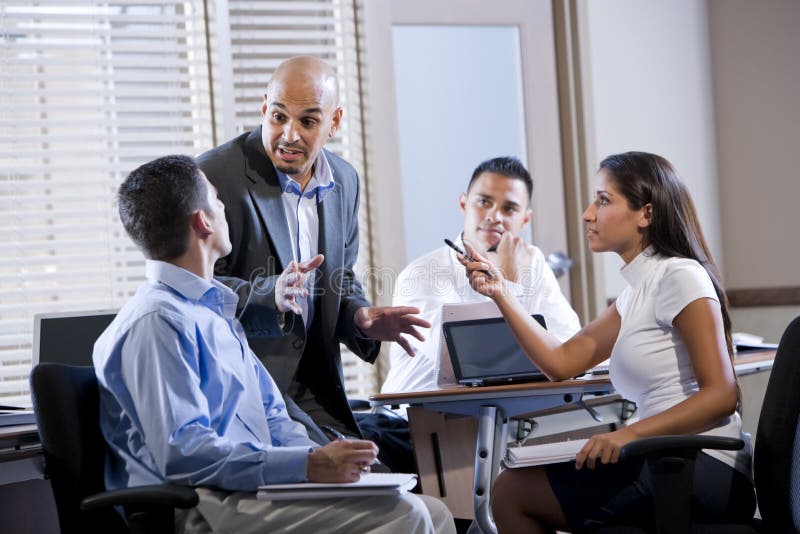 Manager meeting with office workers, directing stock image Manager meeting with office workers, directing stock image