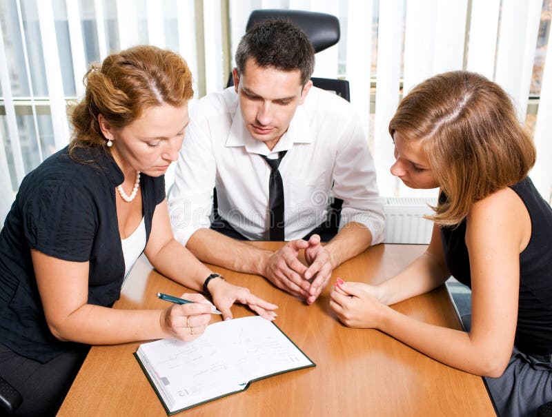 Manager with office workers