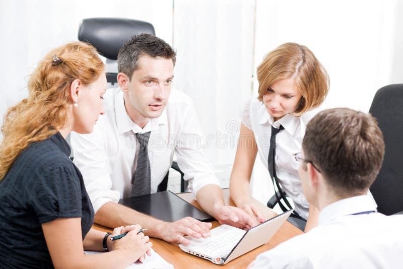 Manager with office workers on meeting