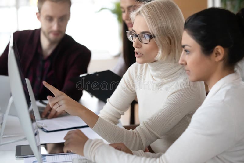 Manager showing work application, explaining task or project stock photography