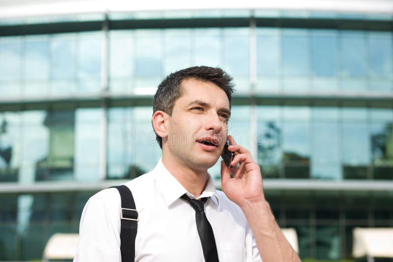 Manager speak on phone across office