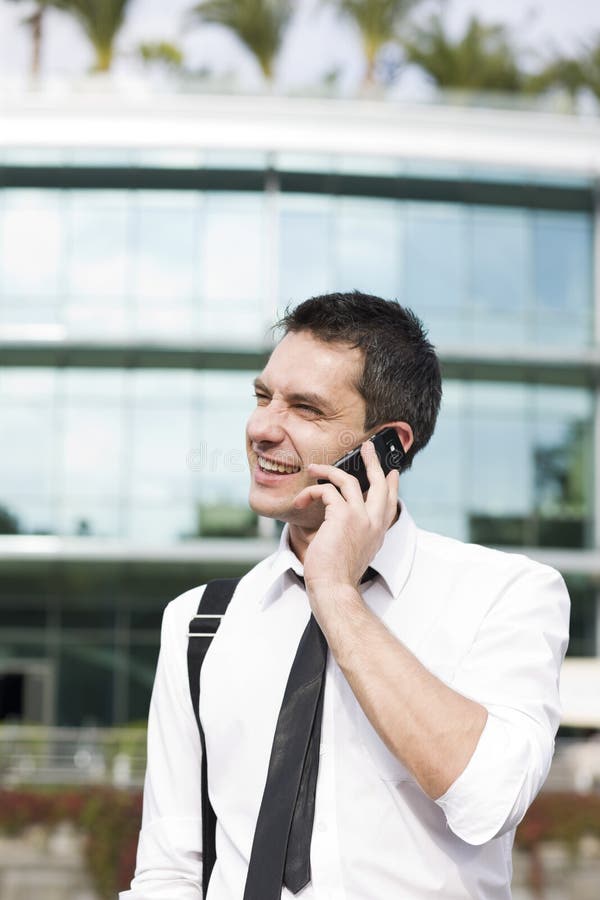 Manager speak on phone across office