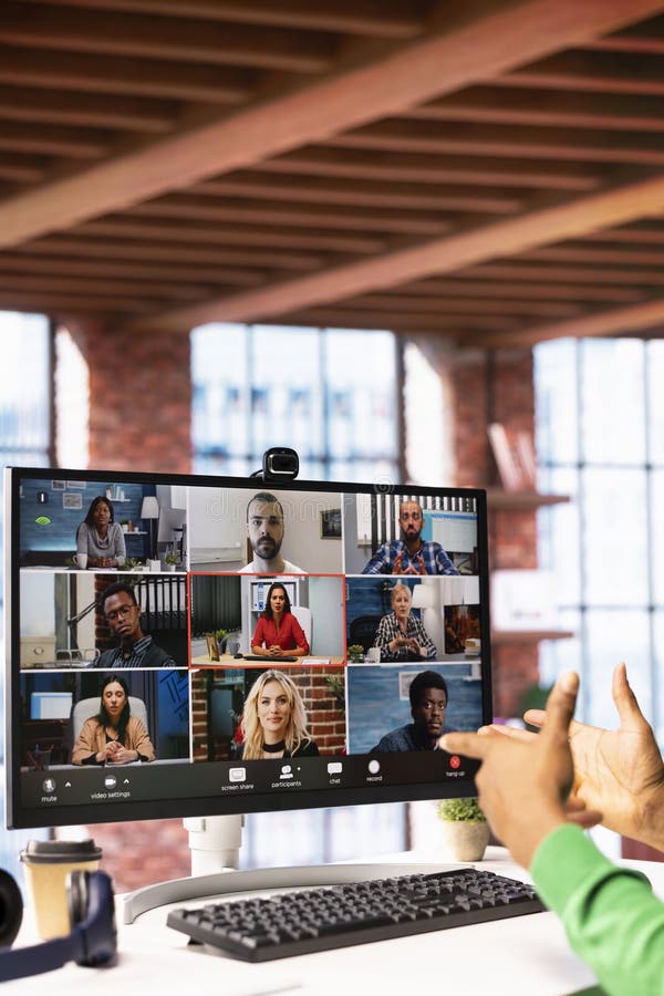 Manager talking with employees during videocall from home royalty free stock image
