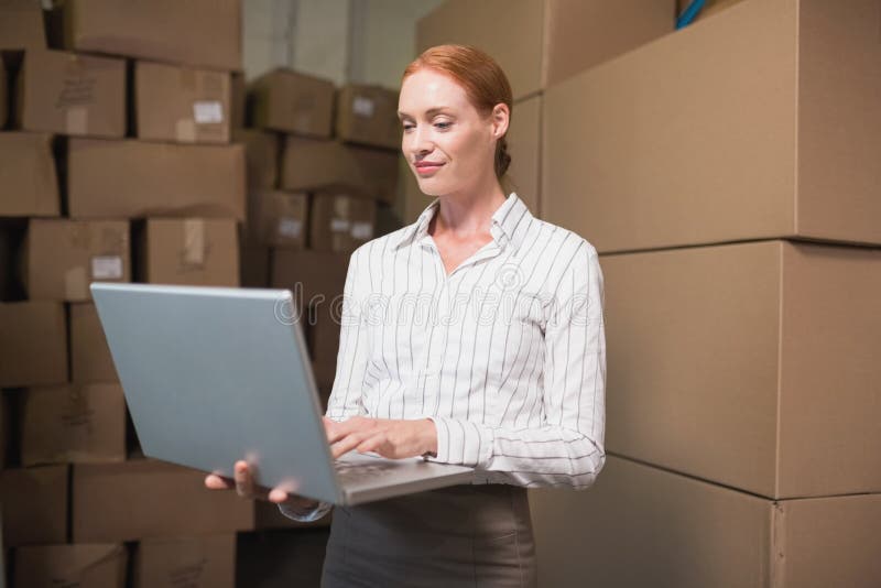 Manager Using Laptop in Warehouse Stock Photo Image of freight