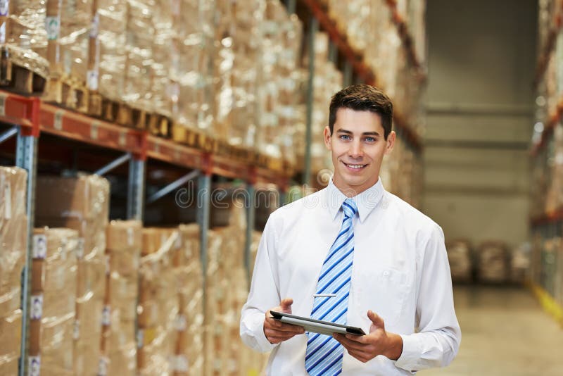 Manager worker in warehouse royalty free stock image Manager worker in warehouse royalty free stock image
