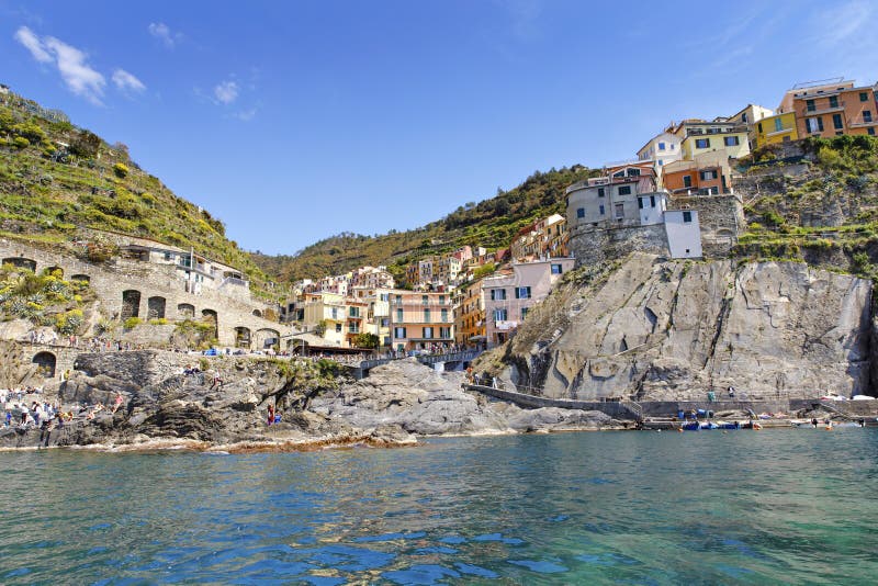 Manarola, Liguria, Italy fisherman village, colorful houses on sunny warm day. Monterosso al Mare, Vernazza, Corniglia royalty free stock photo Manarola, Liguria, Italy fisherman village, colorful houses on sunny warm day. Monterosso al Mare, Vernazza, Corniglia royalty free stock photo