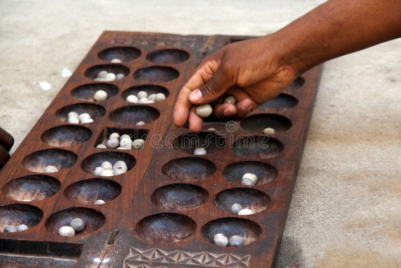Mancala-Spiel lizenzfreie stockbilder Mancala-Spiel lizenzfreie stockbilder