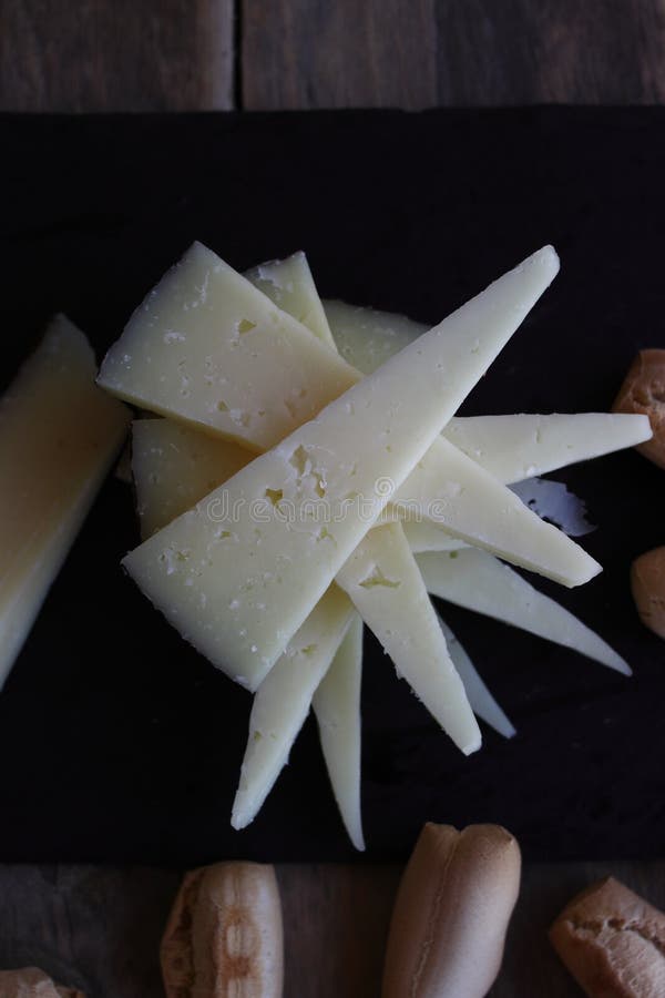 Manchego Cheese, Typical Spanish Stock Photo Image of petal, hand 268451712