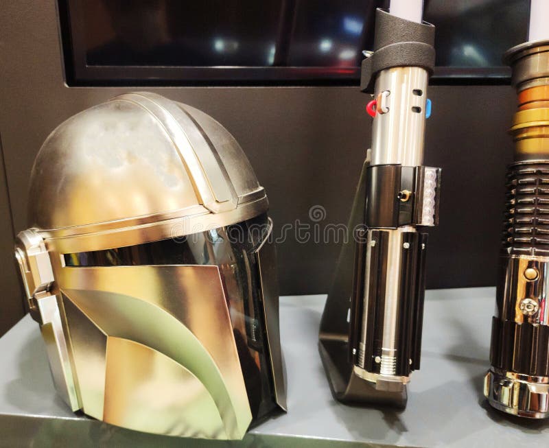 Mandalorian Armour Prop with Lightsabers with Golden Reflection Stock Image Image of armour