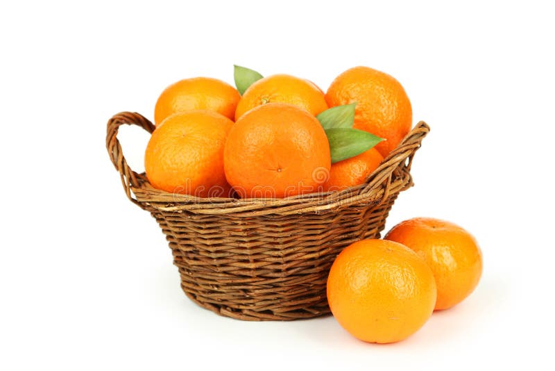 Mandarin in basket isolated on white.