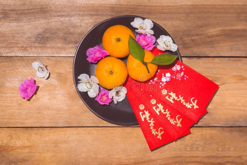 Mandarin oranges and Lunar New Year with text