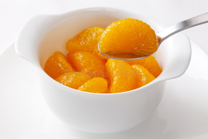 Mandarin Oranges and Spoon royalty free stock image