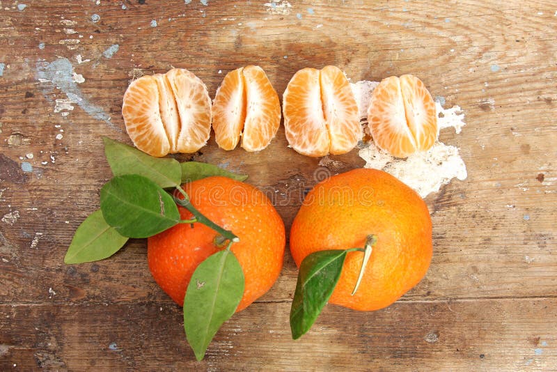 Mandarin fruit on wooden background. Mandarin fruit on wooden background