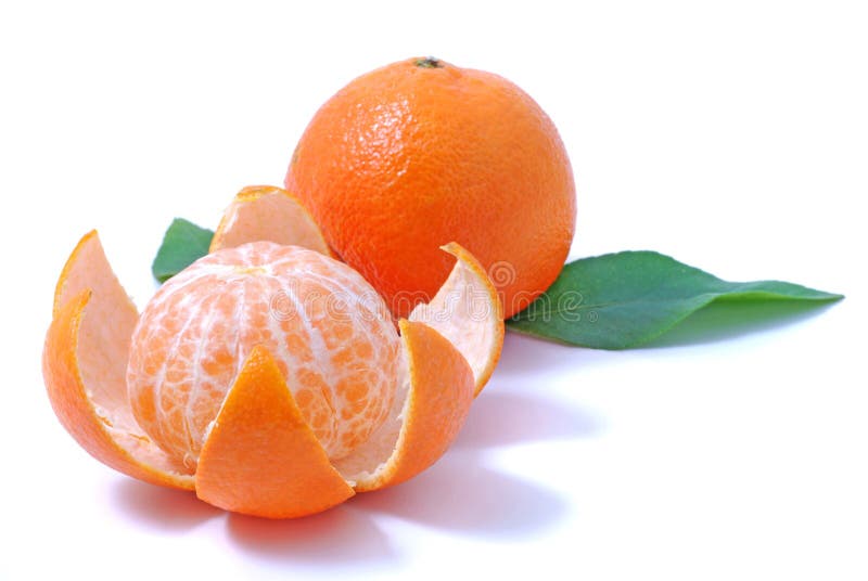 Ripe by mandarin - tropic fruit, with leaves isolated over white background. Ripe by mandarin - tropic fruit, with leaves isolated over white background