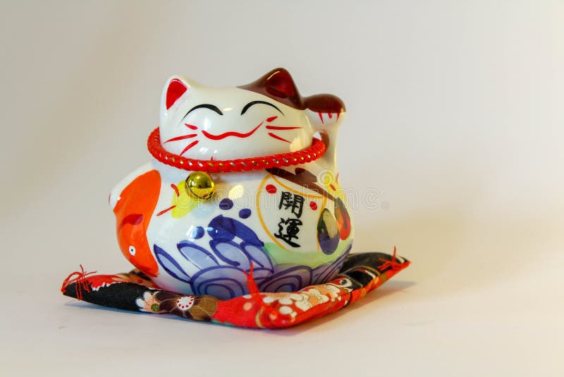 Maneki Neko - ιαπωνική γάτα υποδοχής στοκ φωτογραφίες με δικαίωμα ελεύθερης χρήσης Maneki Neko - ιαπωνική γάτα υποδοχής στοκ φωτογραφίες με δικαίωμα ελεύθερης χρήσης