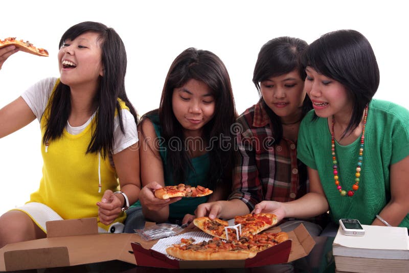 Mangiando pizza insieme immagine stock libera da diritti Mangiando pizza insieme immagine stock libera da diritti