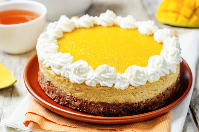 Mango Cheese Cake Decorated with Whipped Cream and Mango Puree Stock Photo Image of piece