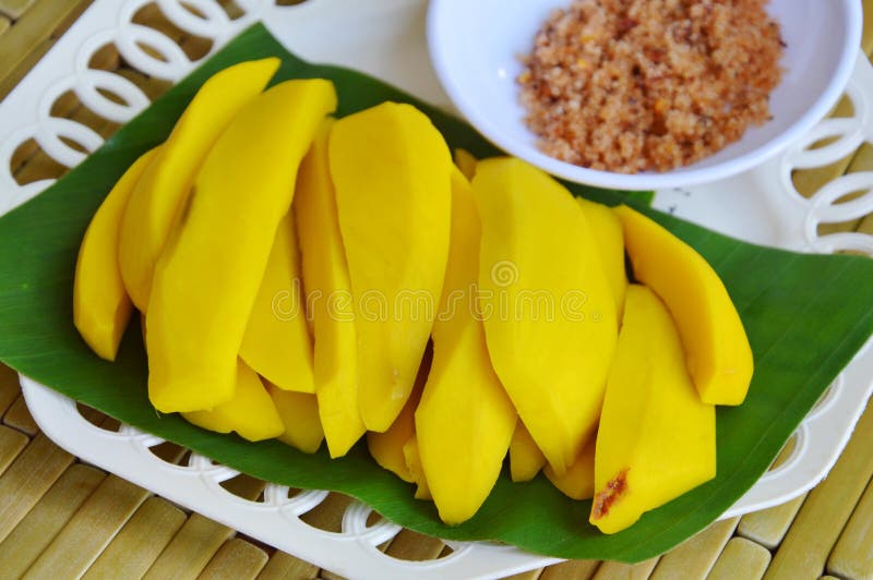 Pickled Mango Sweet and Sour Taste Dipping with Salt Pepper Stock Image