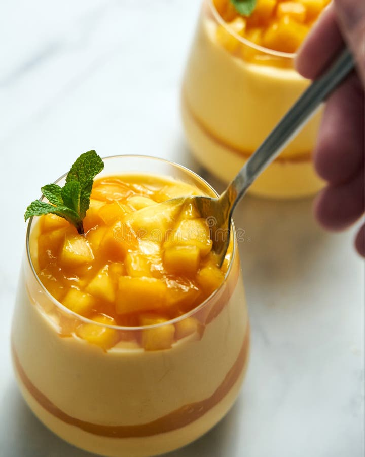 Mango Mousse in Glass. a Delicate Dessert of Mango Puree, Cream, and ...