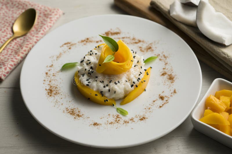 Mango Sticky Rice. Sticky Rice Cooked with Coconut Milk with Fresh