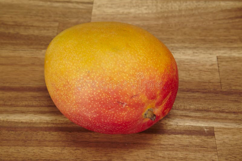 Mango on a Tabletop of Acacia Wood Stock Image Image of mango