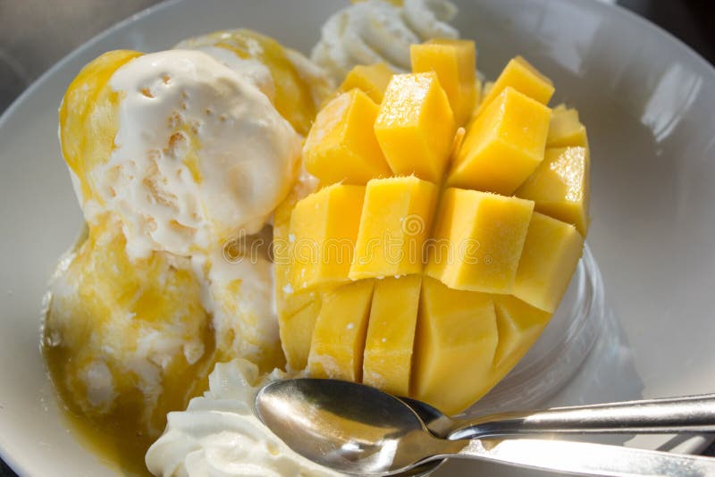 Mango and Vanilla Ice Cream Stock Photo Image of scoop, plate 68087218