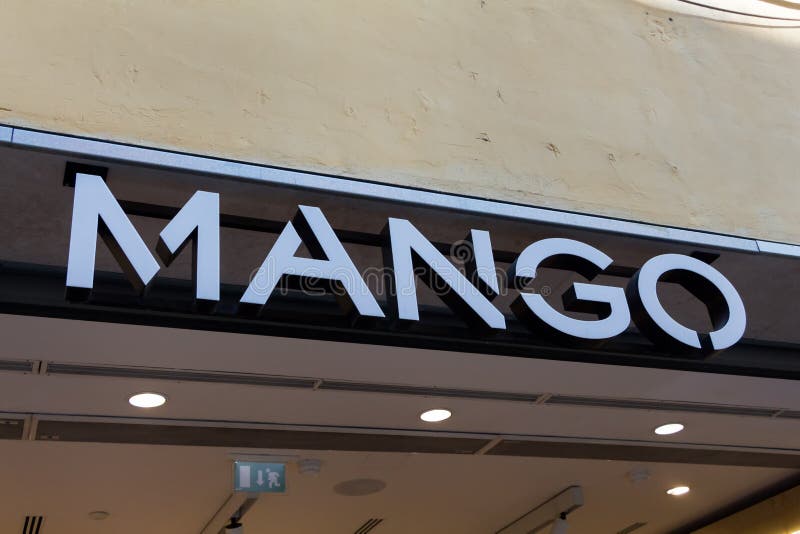 Mangologoen på mango shoppar royaltyfria foton Mangologoen på mango shoppar royaltyfria foton