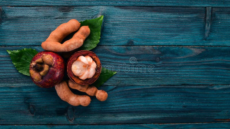 Mangosteen και Rambatan Φρέσκα τροπικά φρούτα στοκ φωτογραφίες με δικαίωμα ελεύθερης χρήσης Mangosteen και Rambatan Φρέσκα τροπικά φρούτα στοκ φωτογραφίες με δικαίωμα ελεύθερης χρήσης