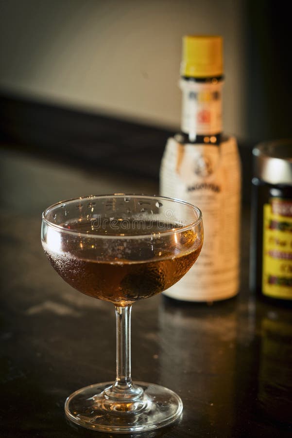 Manhattan classic whisky cocktail drink in bar stock image Manhattan classic whisky cocktail drink in bar stock image