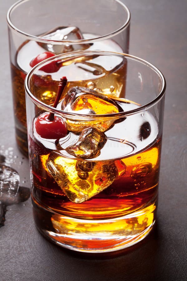 Manhattan cocktail glasses stock image. Image of mixed 94624739