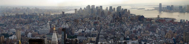 Panoramic view of the downtown of Manhattan on a low grunge and sepia color. Panoramic view of the downtown of Manhattan on a low grunge and sepia color.