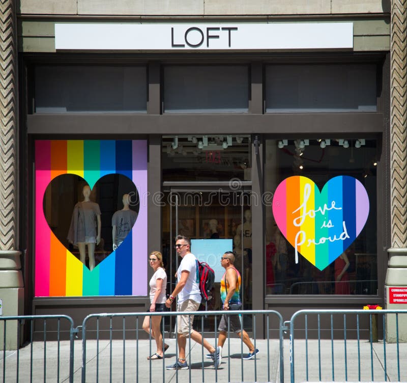 Two men waiting for the beginning of the 2018 New York City Pride Parade.