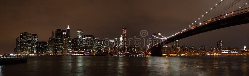 Manhattan Skyline and Brooklyn Bridge at Night royalty free stock images Manhattan Skyline and Brooklyn Bridge at Night royalty free stock images