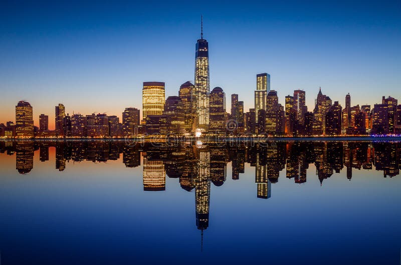 Manhattan Skyline with the One World Trade Center building at twilight stock photography