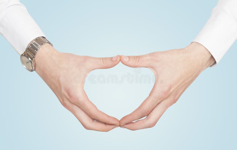 Mani che creano forma fotografia stock libera da diritti Mani che creano forma fotografia stock libera da diritti
