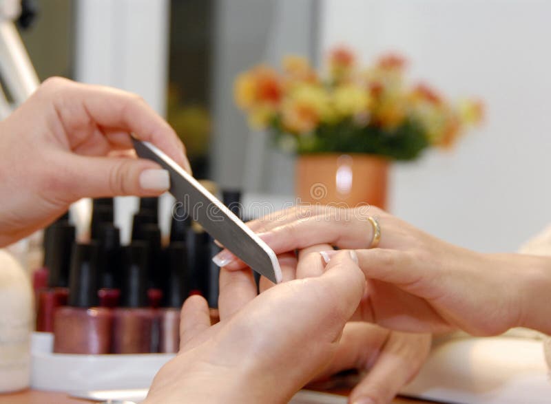 A manicure is in a beauty salon