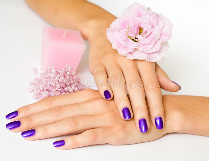 Manicure, flower, candle and beads