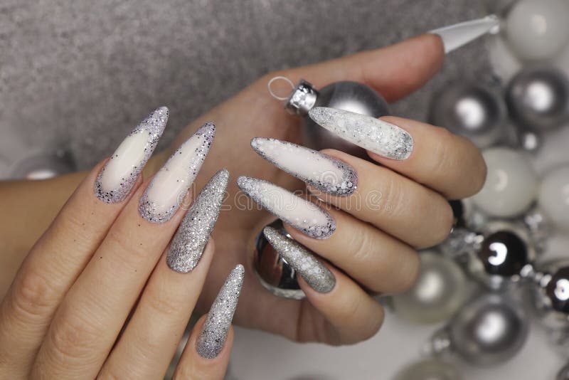 Manicure on long nails .