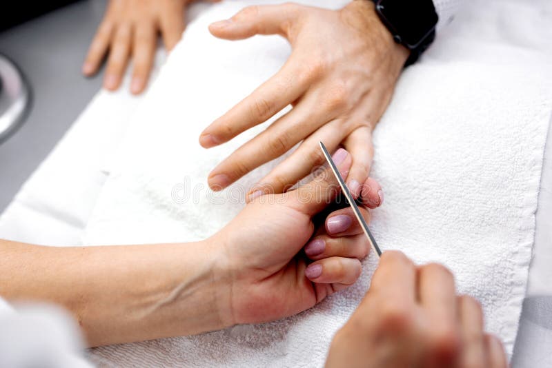 Manicure for men, treatment of hand nails royalty free stock photography