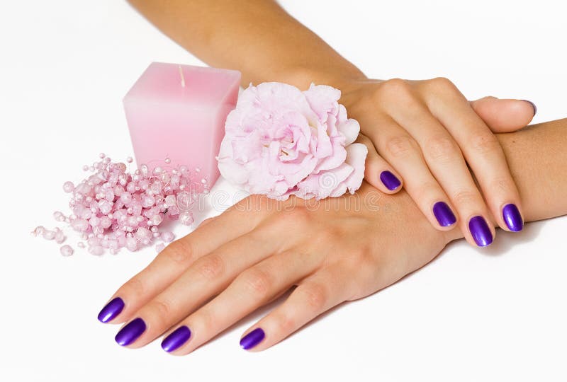 Manicure, pink flower, candle, beads